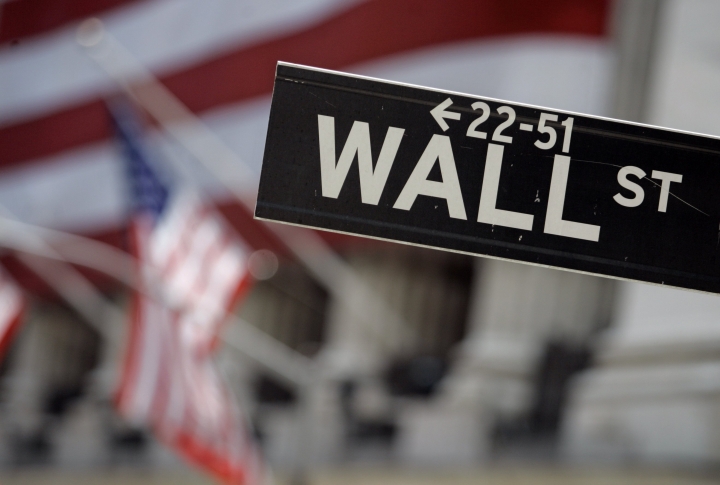 Asian shares slide after US losses due to lower oil prices