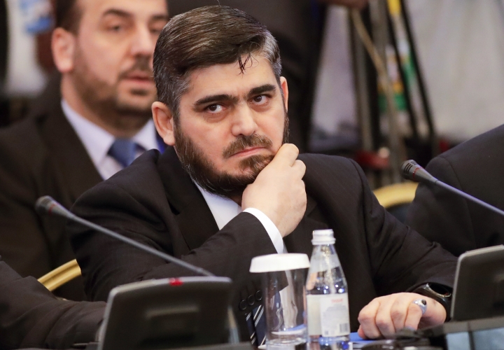 Icy, brief face-to-face meeting of Syria government, rebels