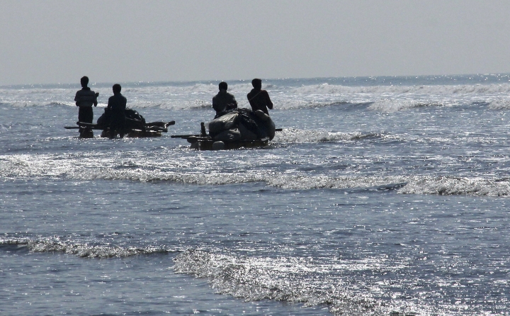 Banned from boats in Myanmar, Rohingya fish on rafts of junk