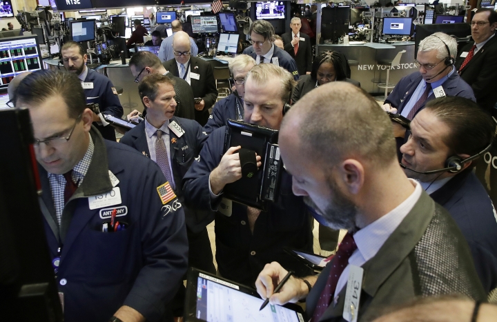 Asian stocks mixed on upbeat US data, rate hike expectations