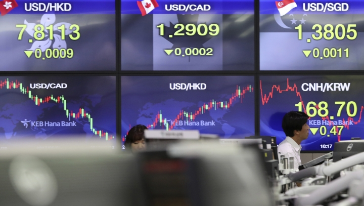 Global stock markets edge up ahead of Fed chair's speech