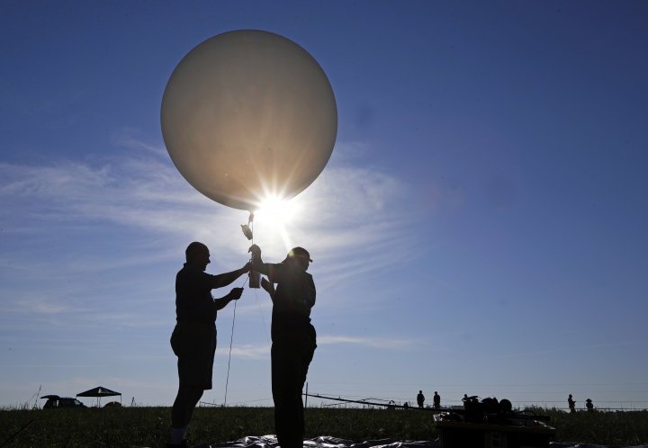 Eclipse science: From galloping giraffes to solar wisps