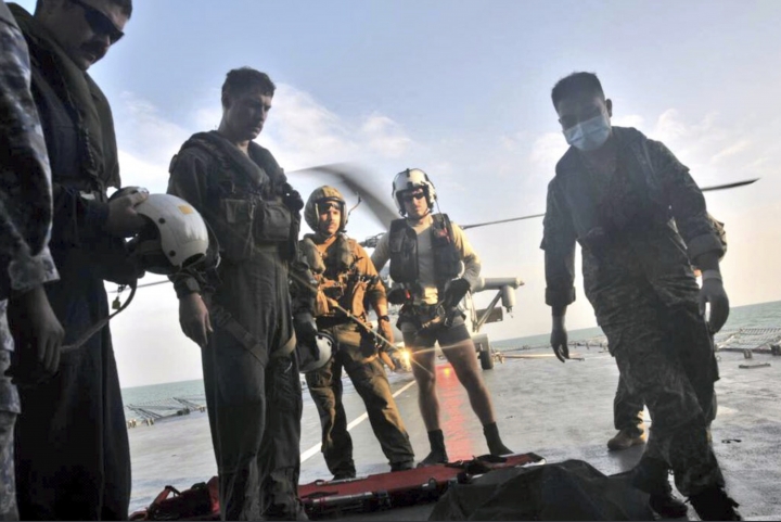 The Latest: Body found at sea not one of McCain's missing