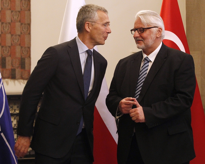 The Latest: Poland slams comments by French leader Macron