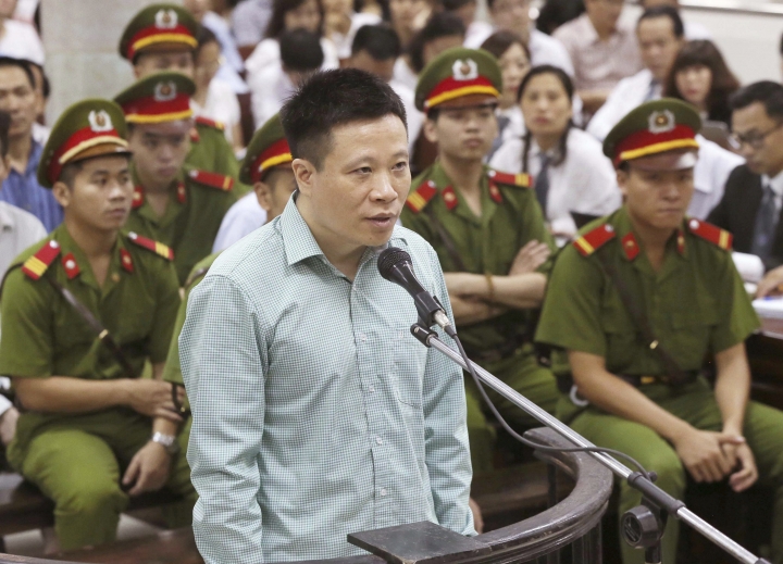 Vietnam tries dozens of bankers for graft, mismanagement