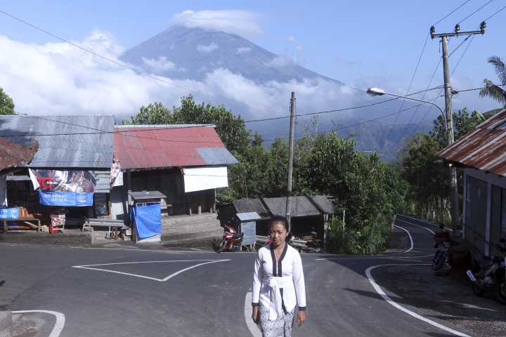 The Latest: Bali volcano fears spark exodus of 75,000
