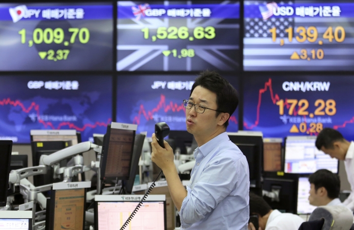 Global stocks stable as investors gauge US tax plan impact