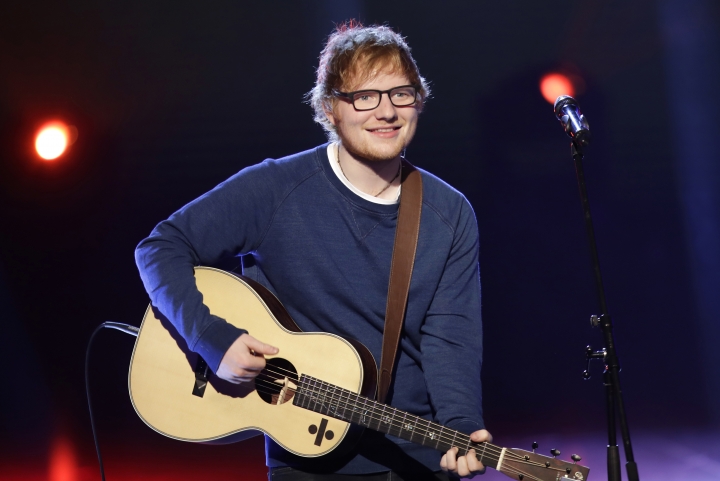 UK singer Ed Sheeran tells fans of bike accident, arm injury