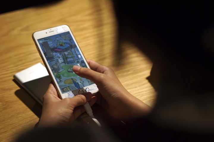 Holidaying frog game finds fans among China's harried youth